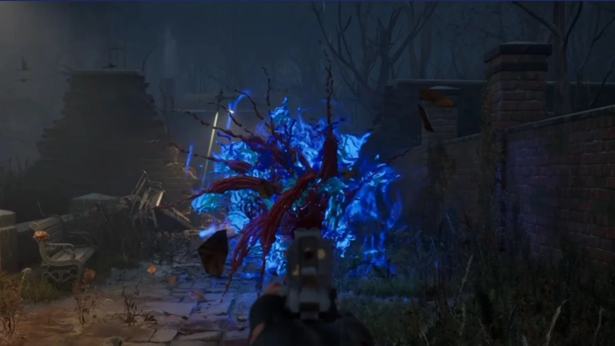 A first-person screenshot from Hellraiser Revival showing a player aiming a gun at a swirling blue and red supernatural entity in a dark, overgrown courtyard at night.