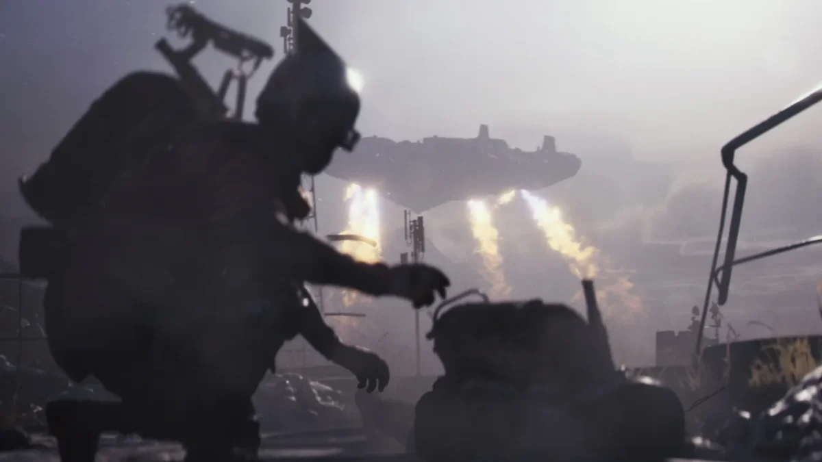 A Raider crouches in the foreground while the ARC Frigate hovers in the distance with its engines glowing