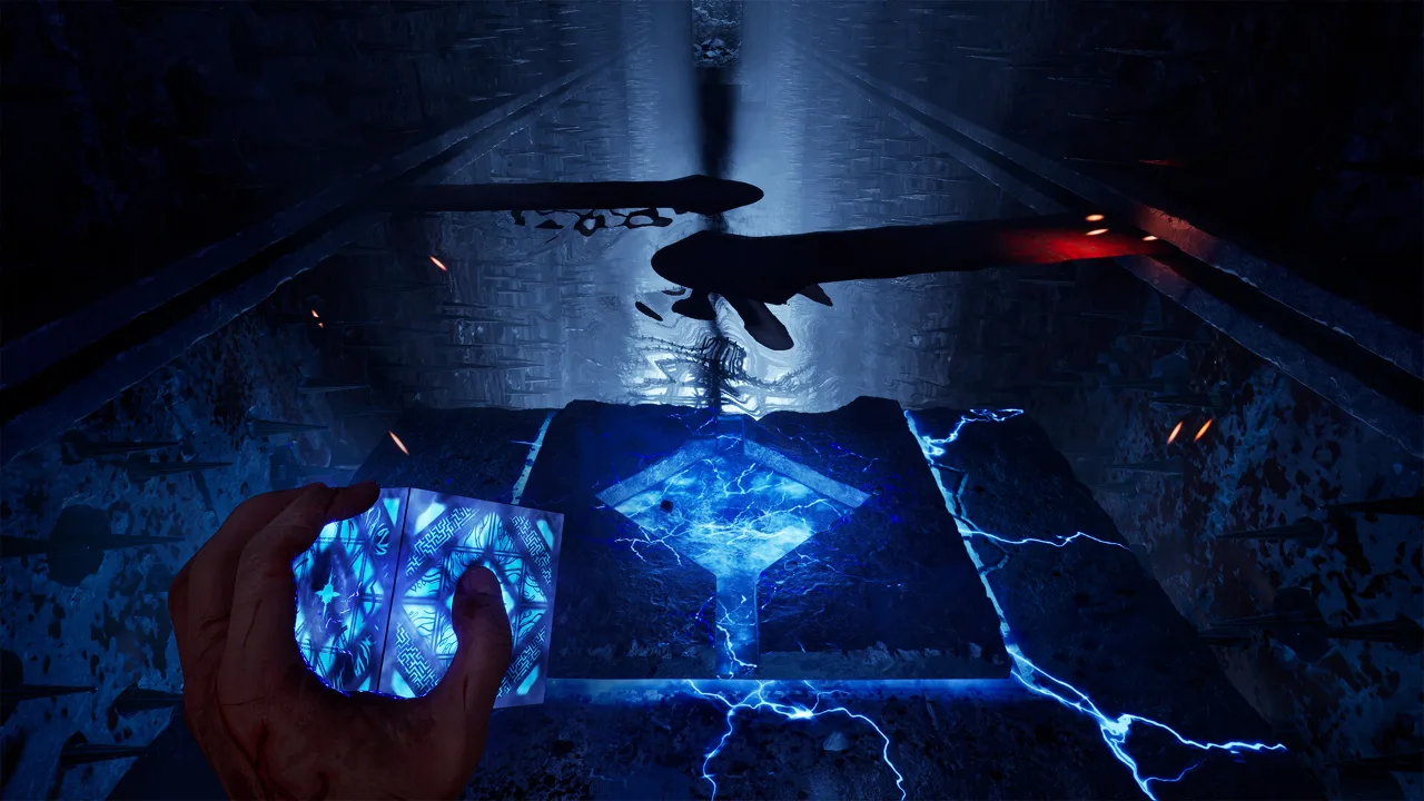 The glowing blue puzzle box held out over a lit walkway in a dark Labyrinth hall in Hellraiser: Revival