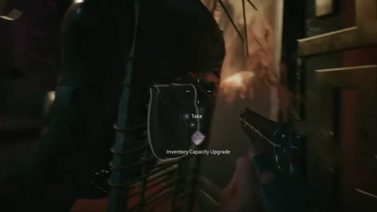 The Inventory Capacity Upgrade bag on a chair in Hellraiser: Revival with the Take prompt showing
