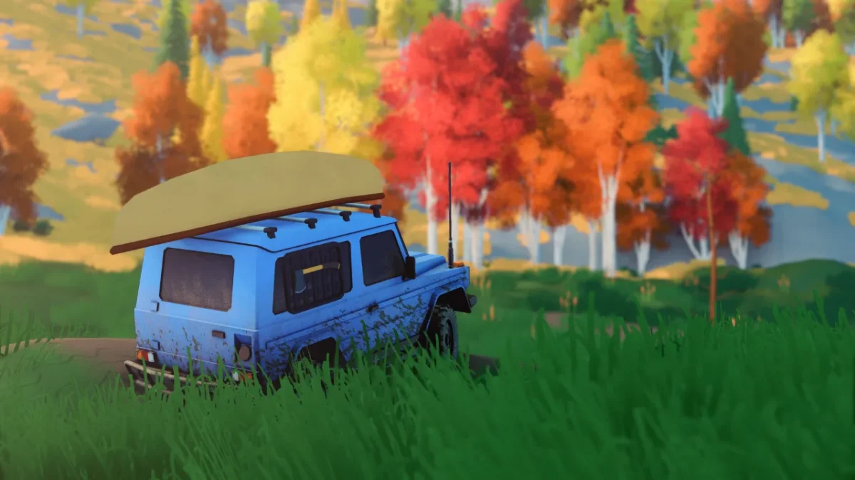 Blue pickup with a canoe on the roof driving through an autumn forest in Over the Hill